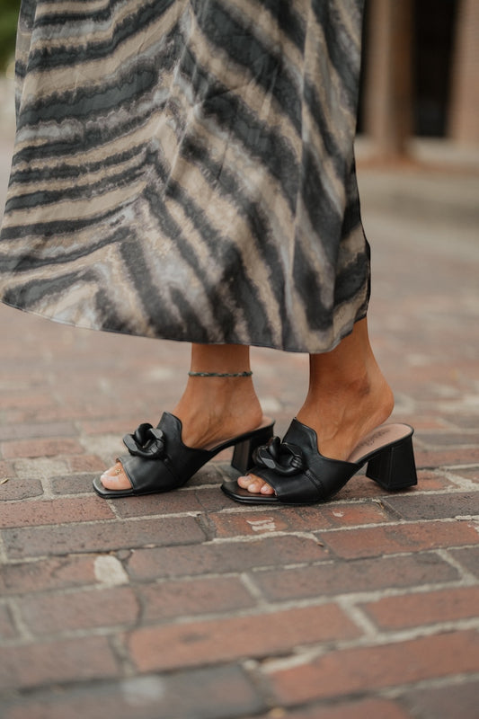 Coterie in Black Heeled Sandals by Naked Feet